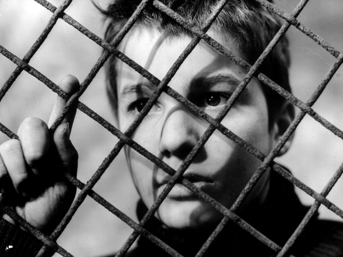 Still from The 400 Blows showing Antoine Doinel running