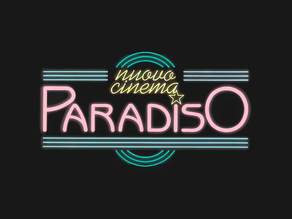 Cinema Paradiso lit neon sign in pink and blue